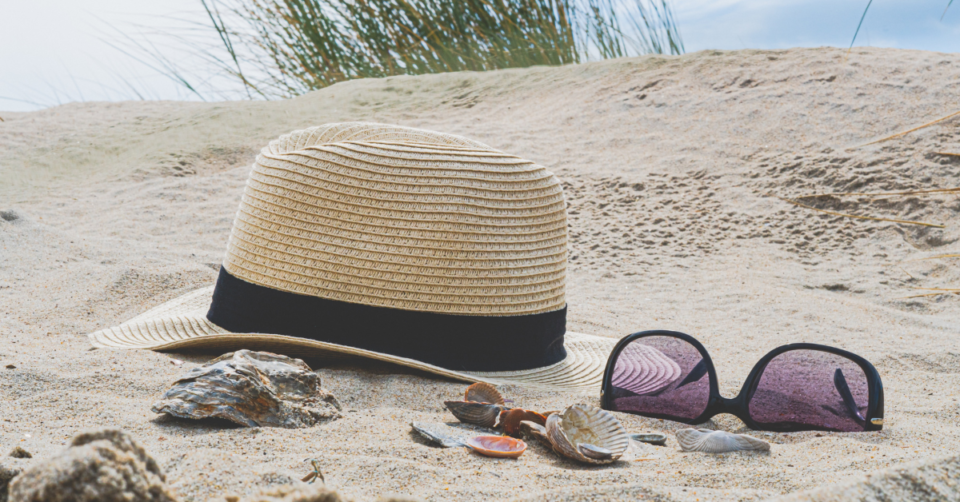 holiday beach hat and sunglasses on beach