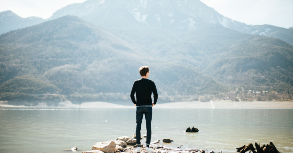 person by a lake