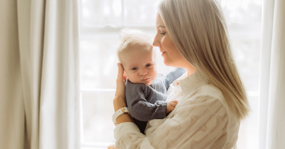 mom holding a baby
