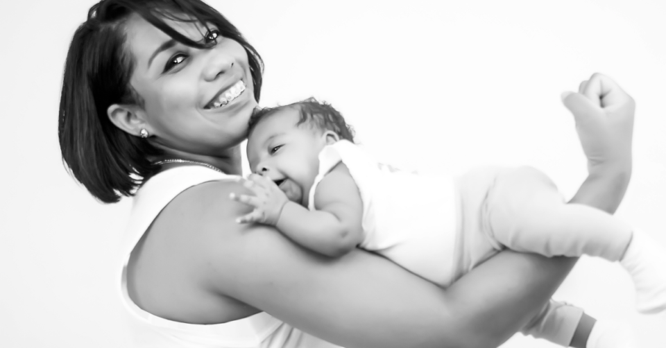 mum with baby on her arm