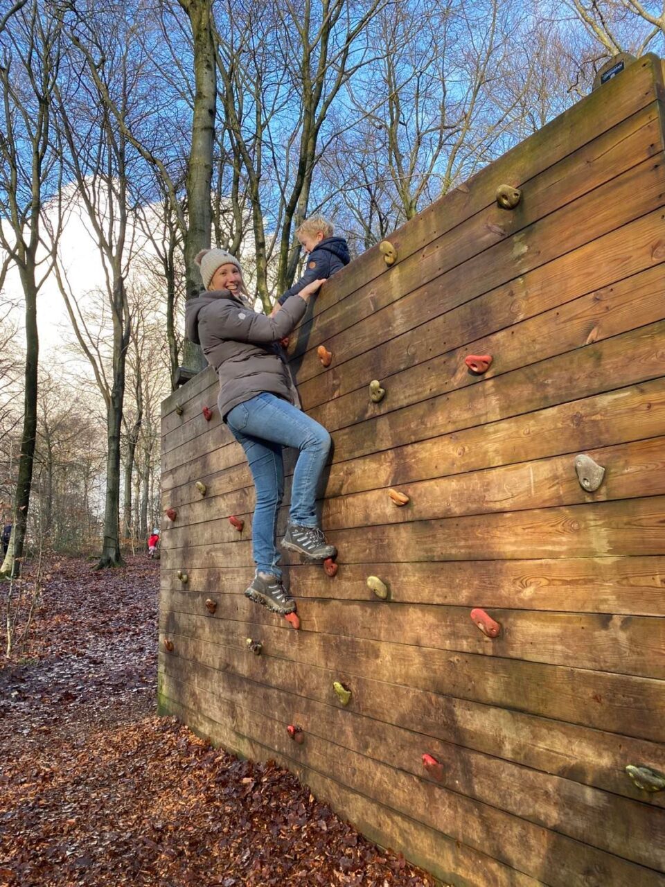 me climbing the wall of the obstacle course at Queen Elizabeth Country Park