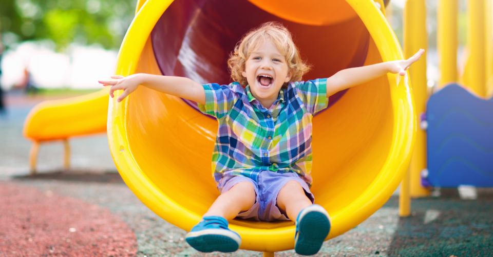 happy child on a slide