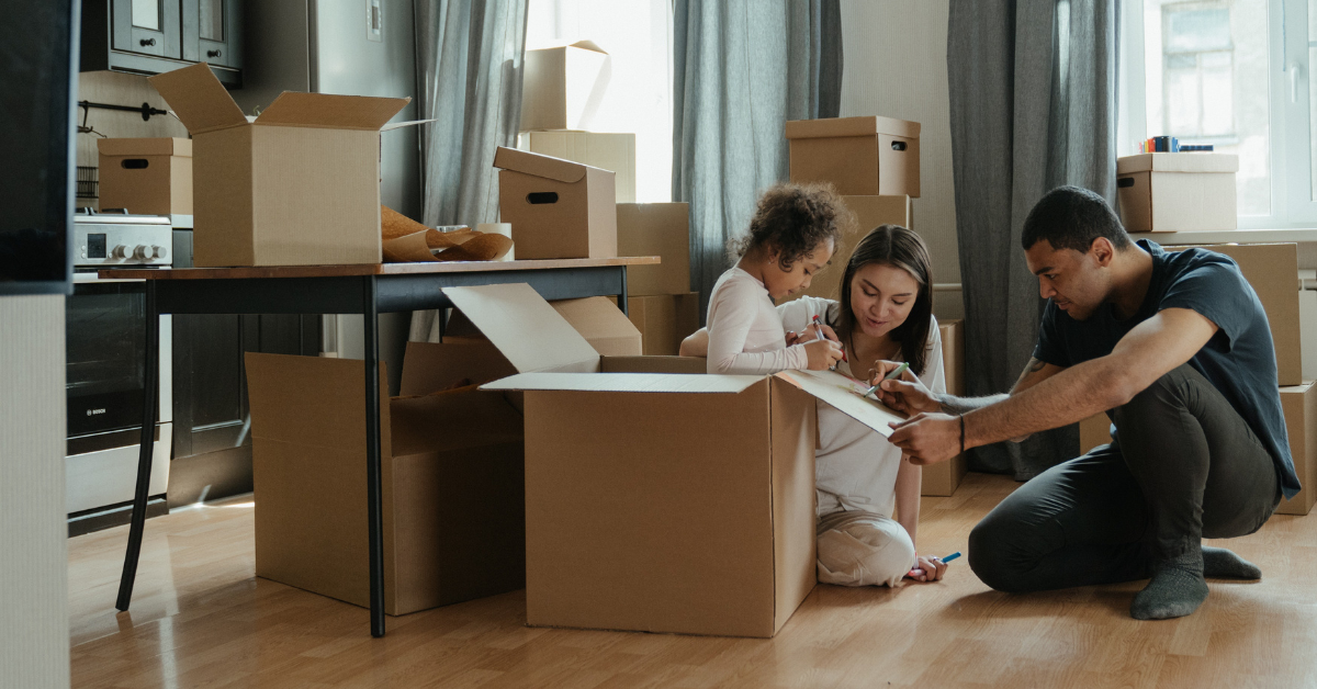 a family packing up belongings for a move