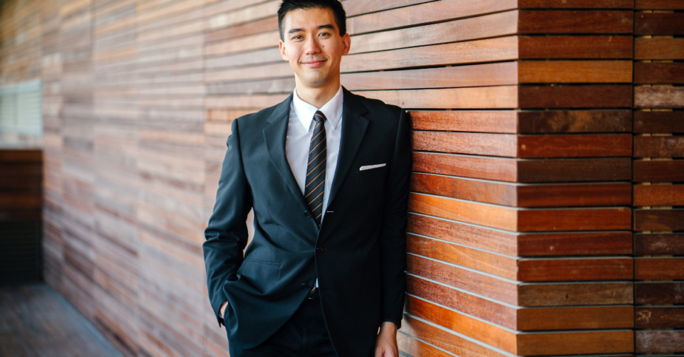 a man stood in a suit