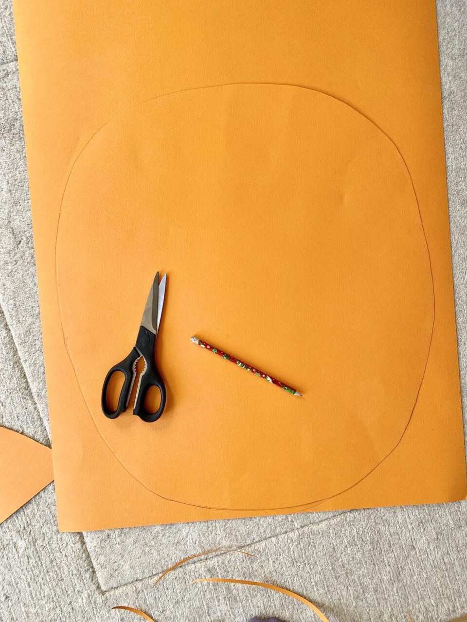 cutting the Mr Tickle body out of the orange card