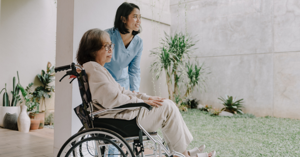 lady in wheelchair next to her daughter