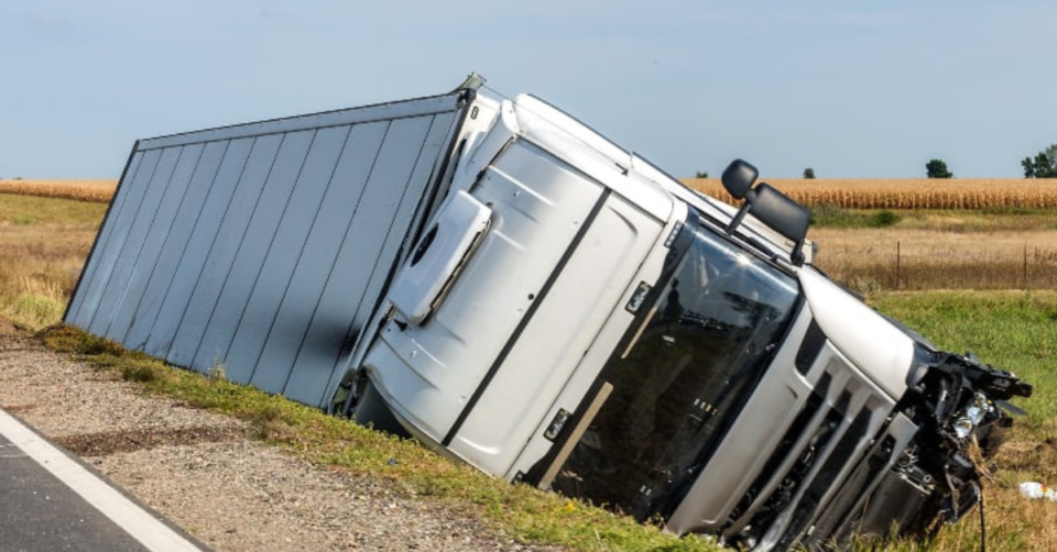 truck on side from accident