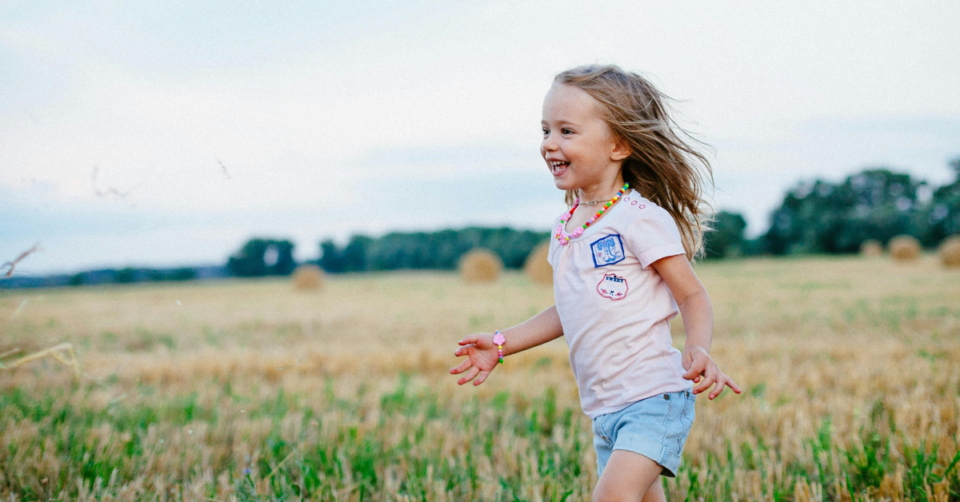 girl running in a field