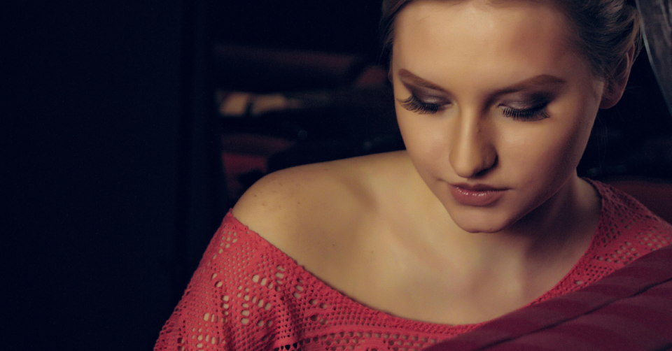 lady in red looking down