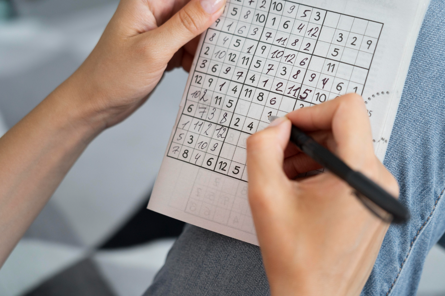 someone doing a sudoku