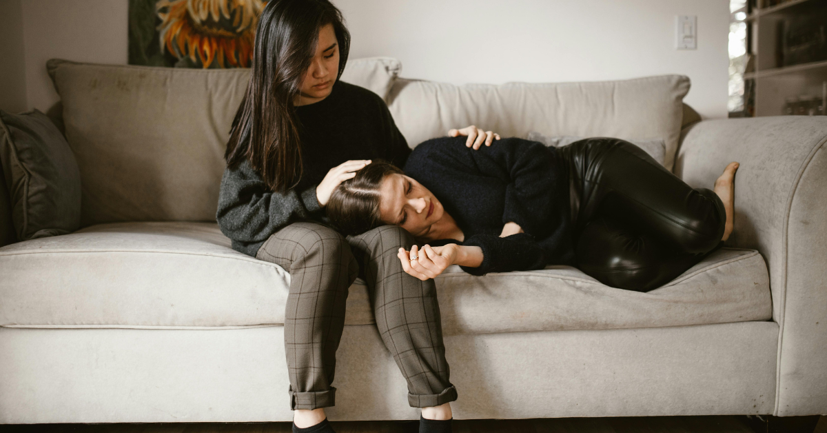 two women on a sofa