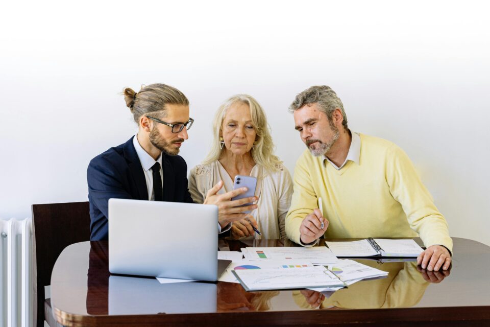 two people talking to a lawyer