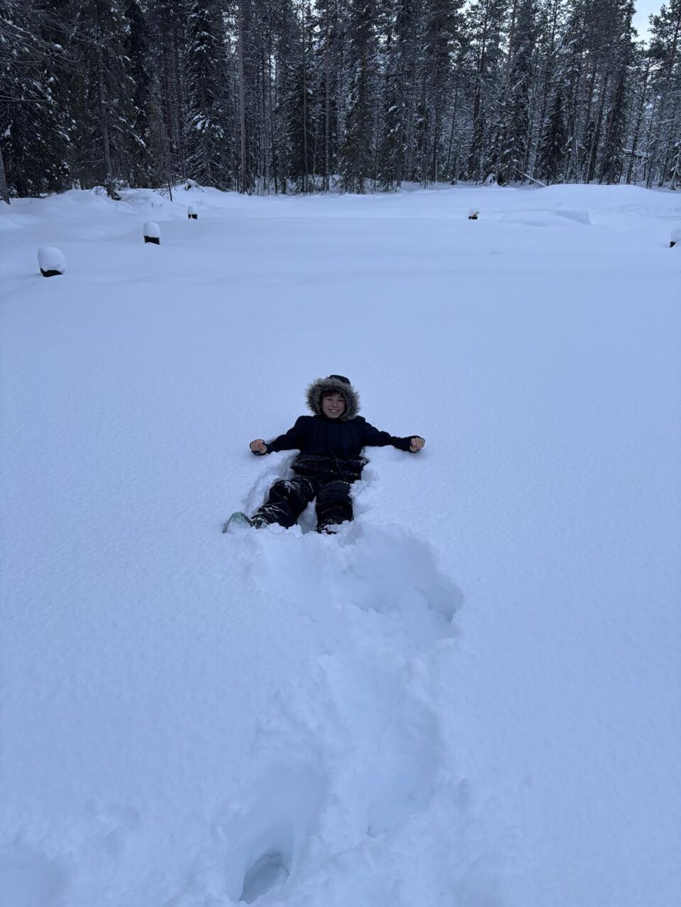 Jake lying in snow