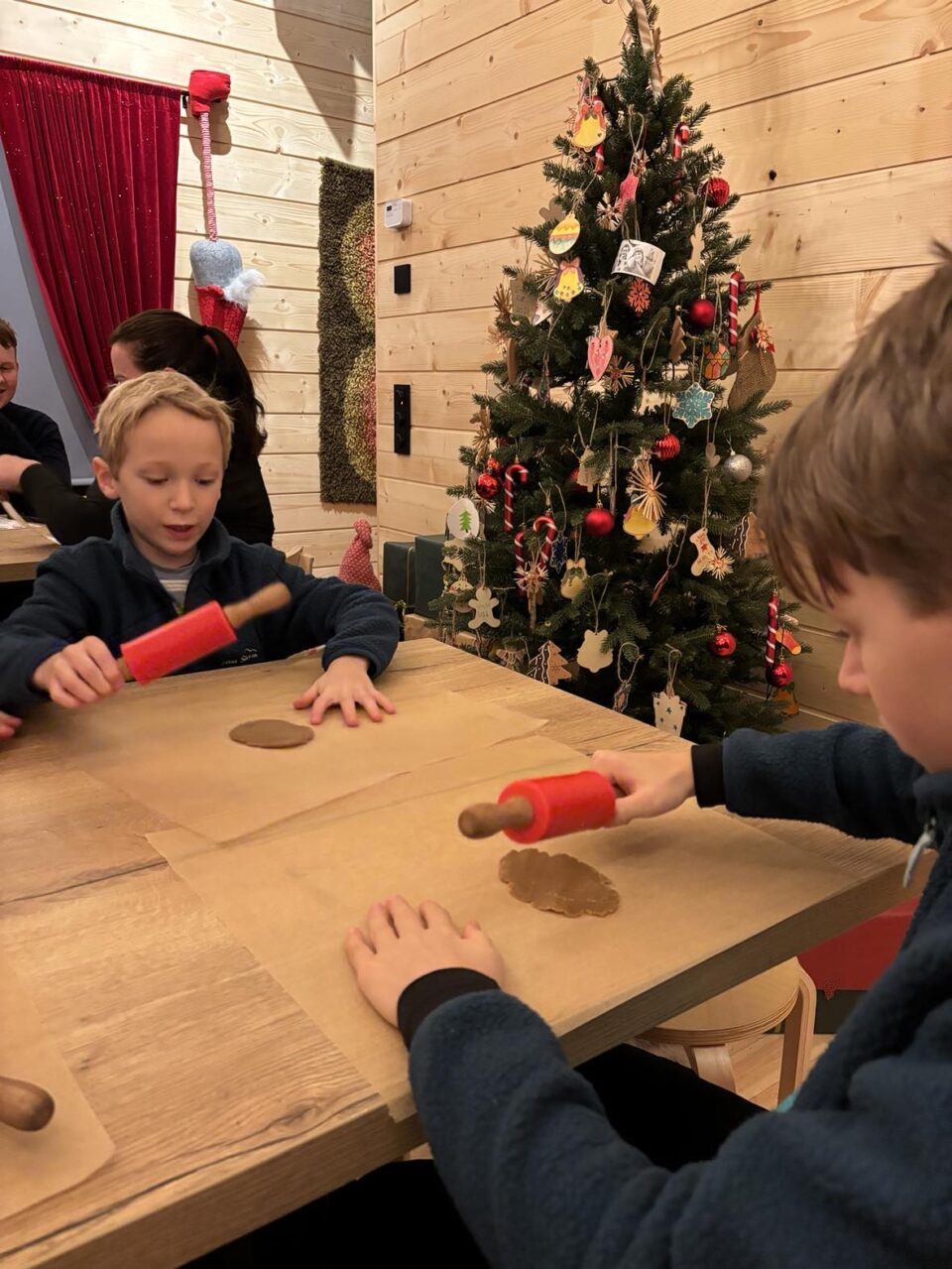 the boys rolling out their gingerbread dough