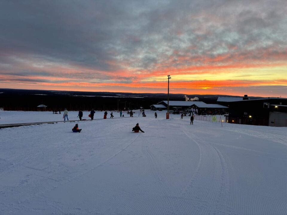 sledging at sunset at Yllas ski resort