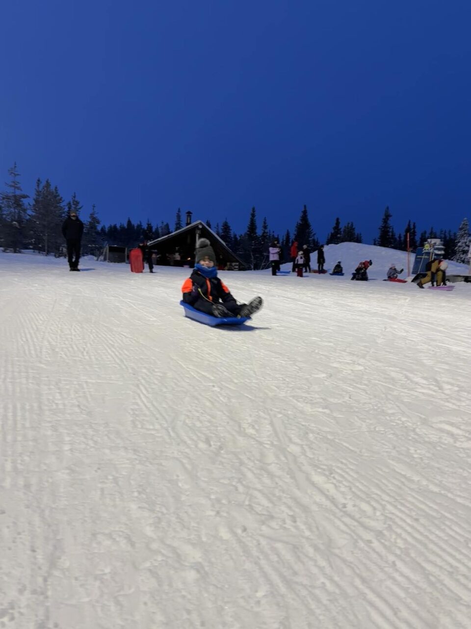 child on sledge at Yllas ski resort