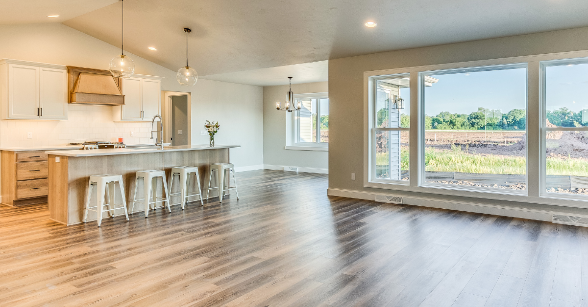 lovely wooden flooring in a kitchen open space area