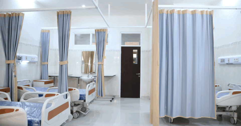 a hospital ward with beds