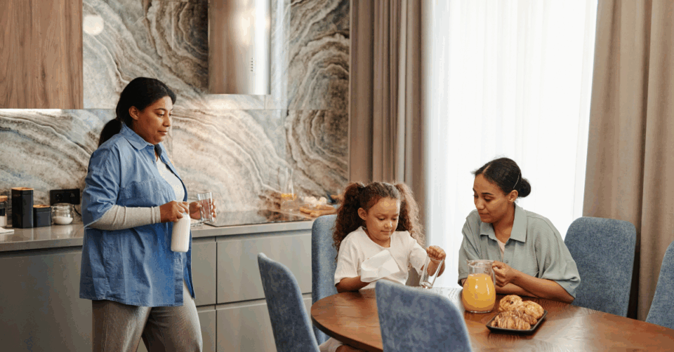 kid and parents at brekkie
