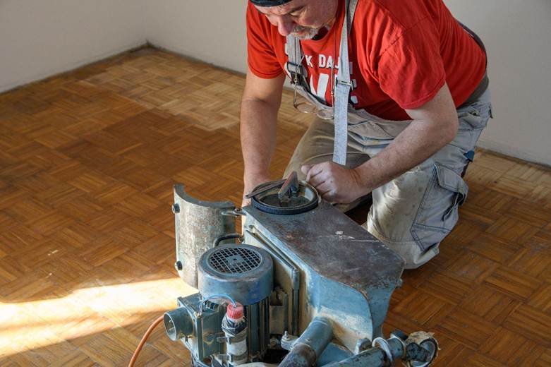 someone sanding floors