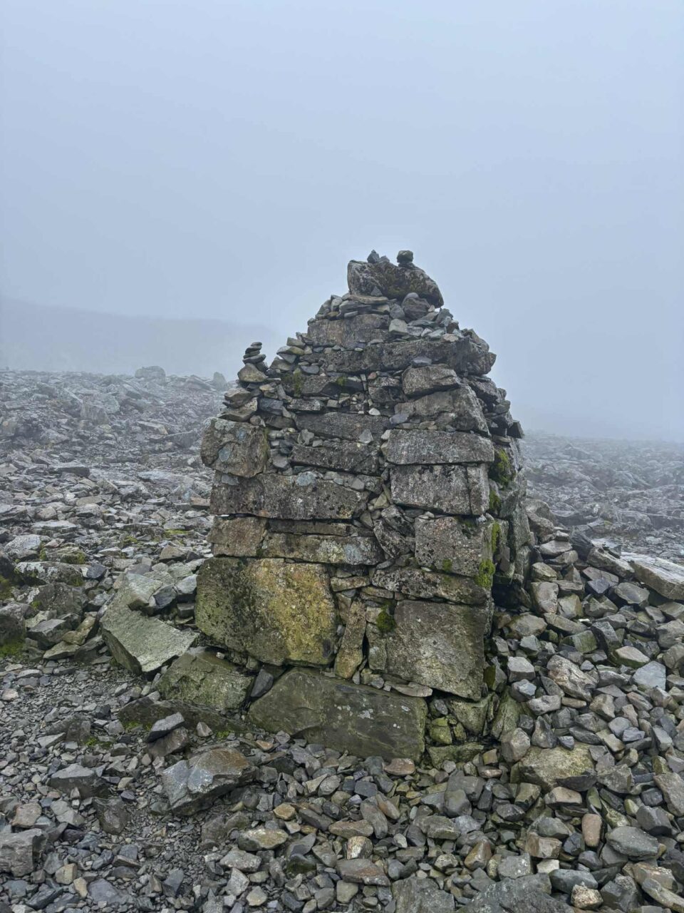 one of the structures built out of rocks and stones to help guide the way up Ben Nevis