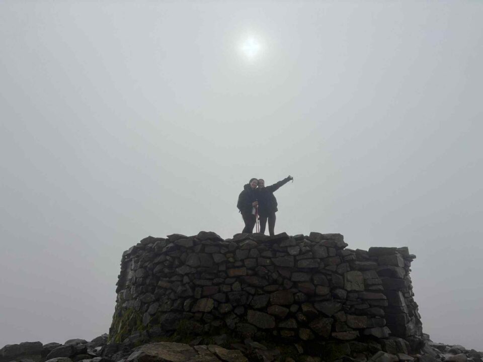 two of the team members at the summit of Scafell Pike