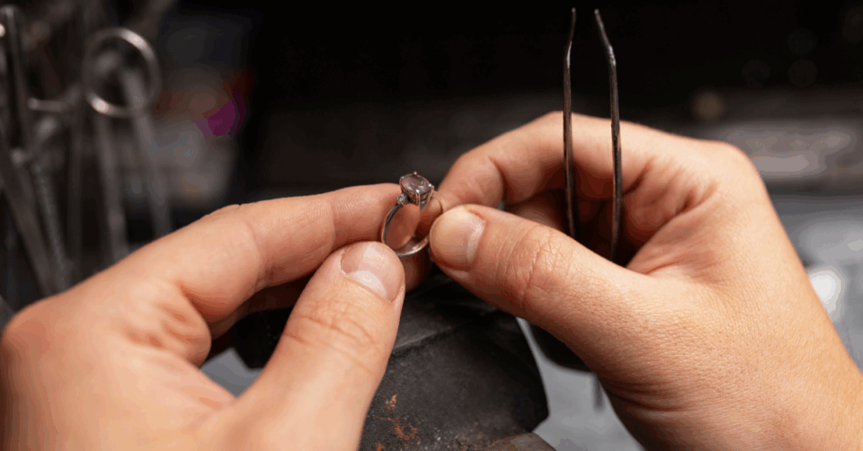 a ring being crafted in somones hands