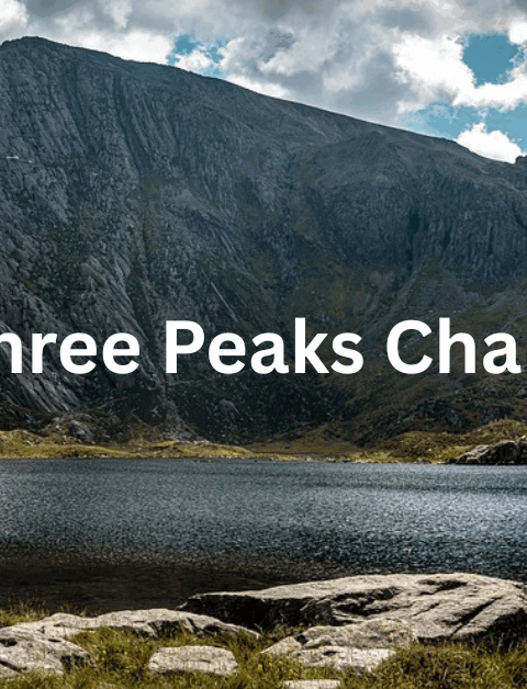 the three peaks challenge over a photo of Snowdon's lake