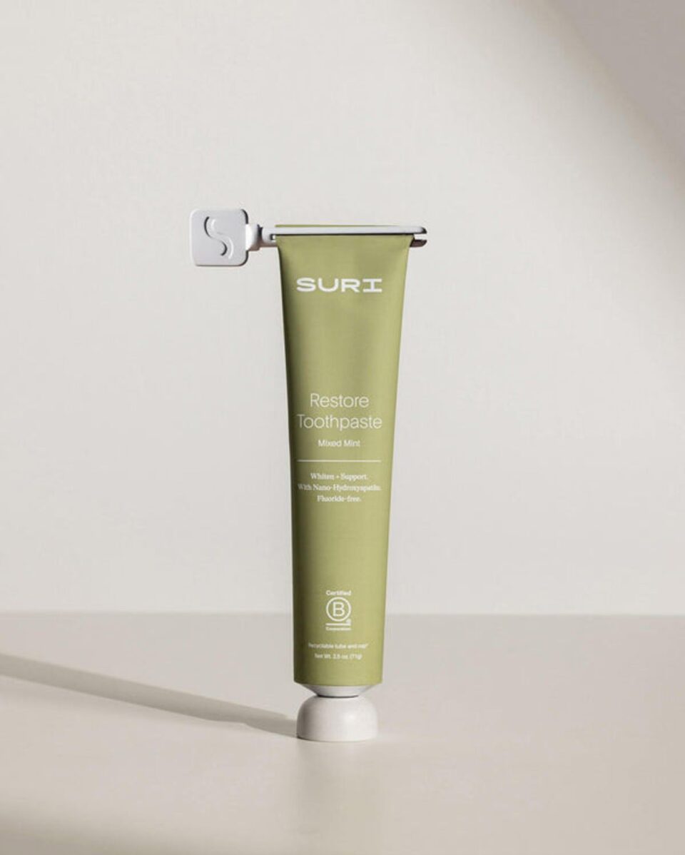 the toothpaste key in use on a toothpaset tube