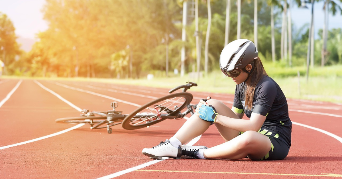 a person who has fallen off their bike