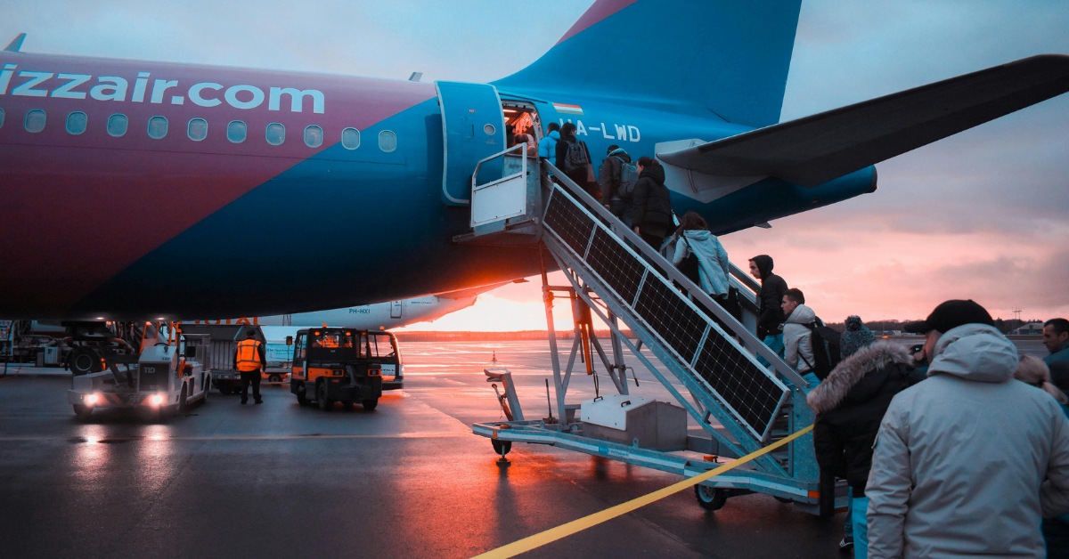 people boarding a plane
