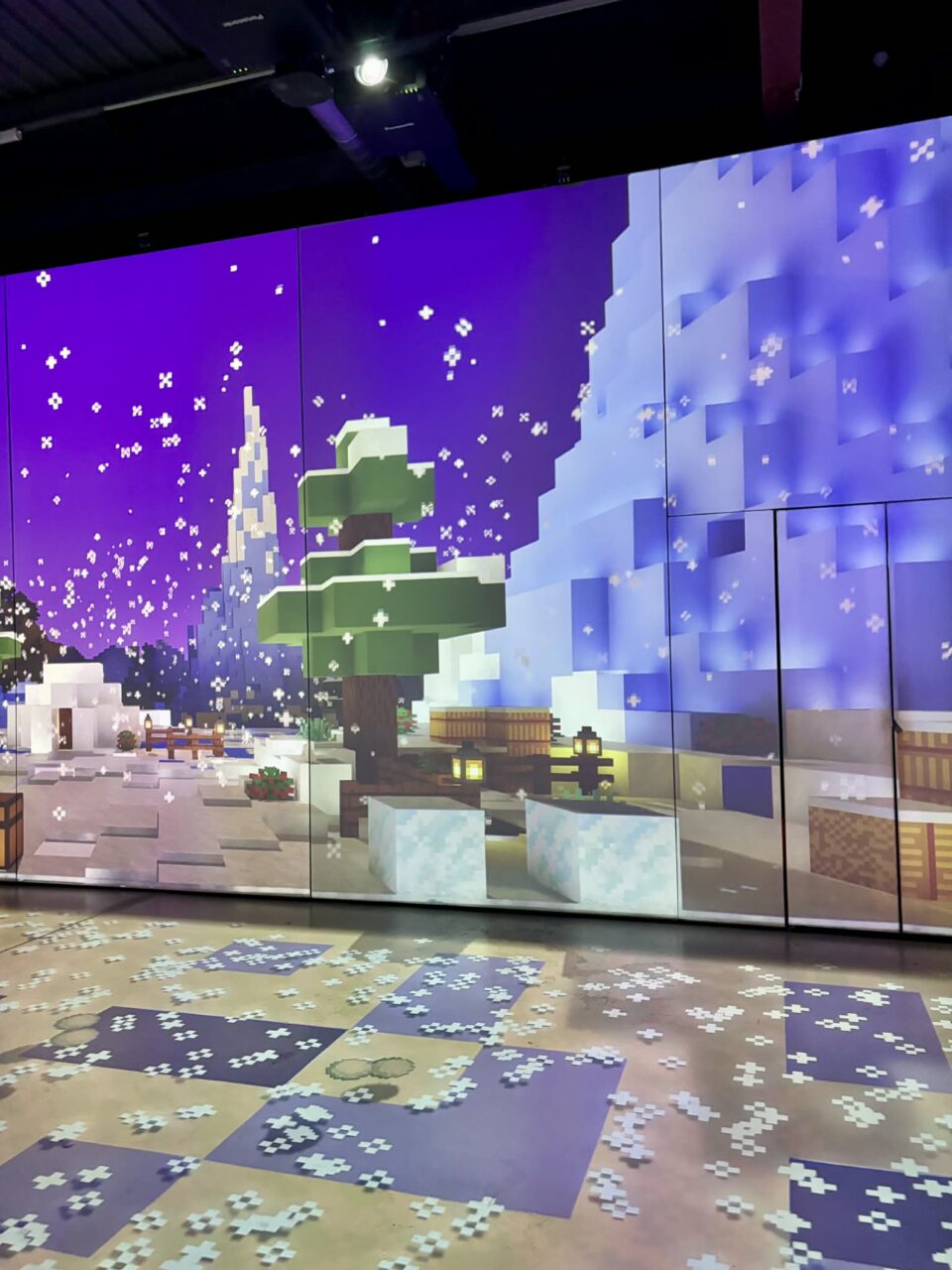 a large screen in the Minecraft Experience