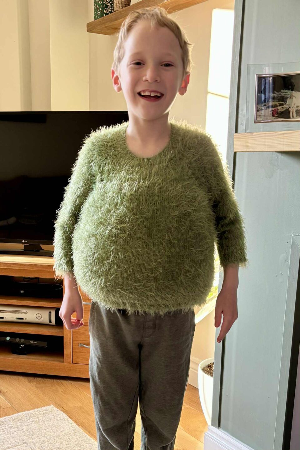 child in the jumper 