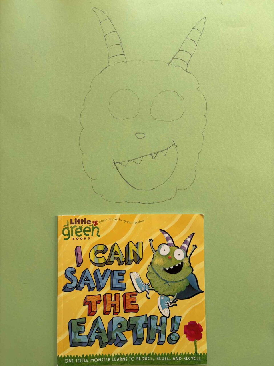 the drawing with the book