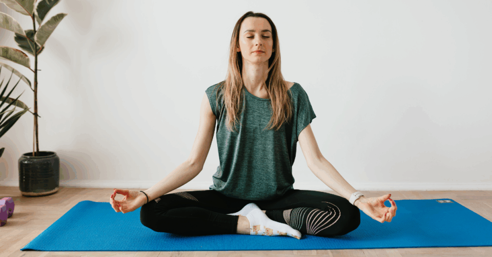a woman doing yoga for wellbeing
