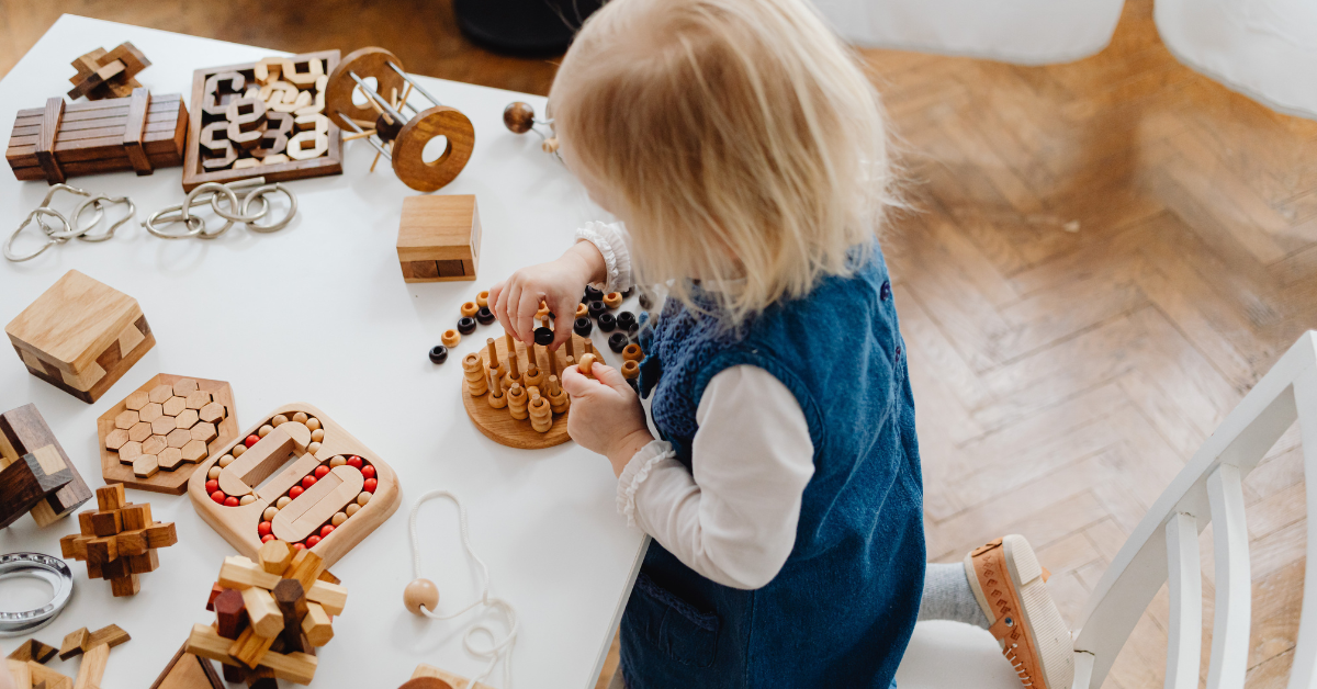child playing at a table