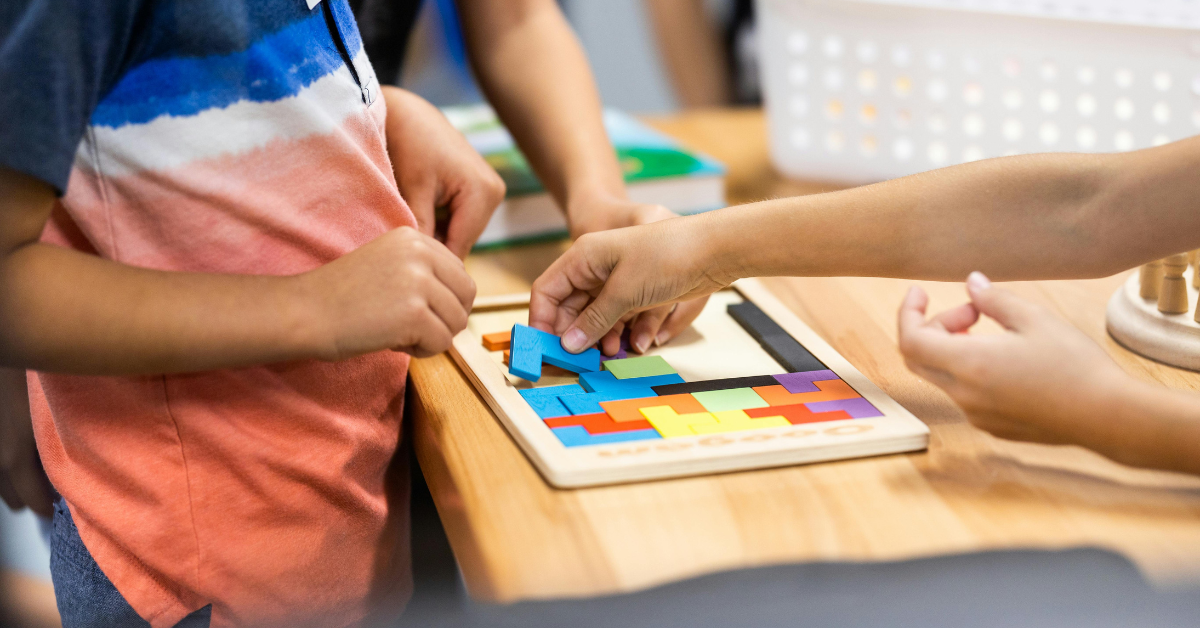 a child doing a puzzle