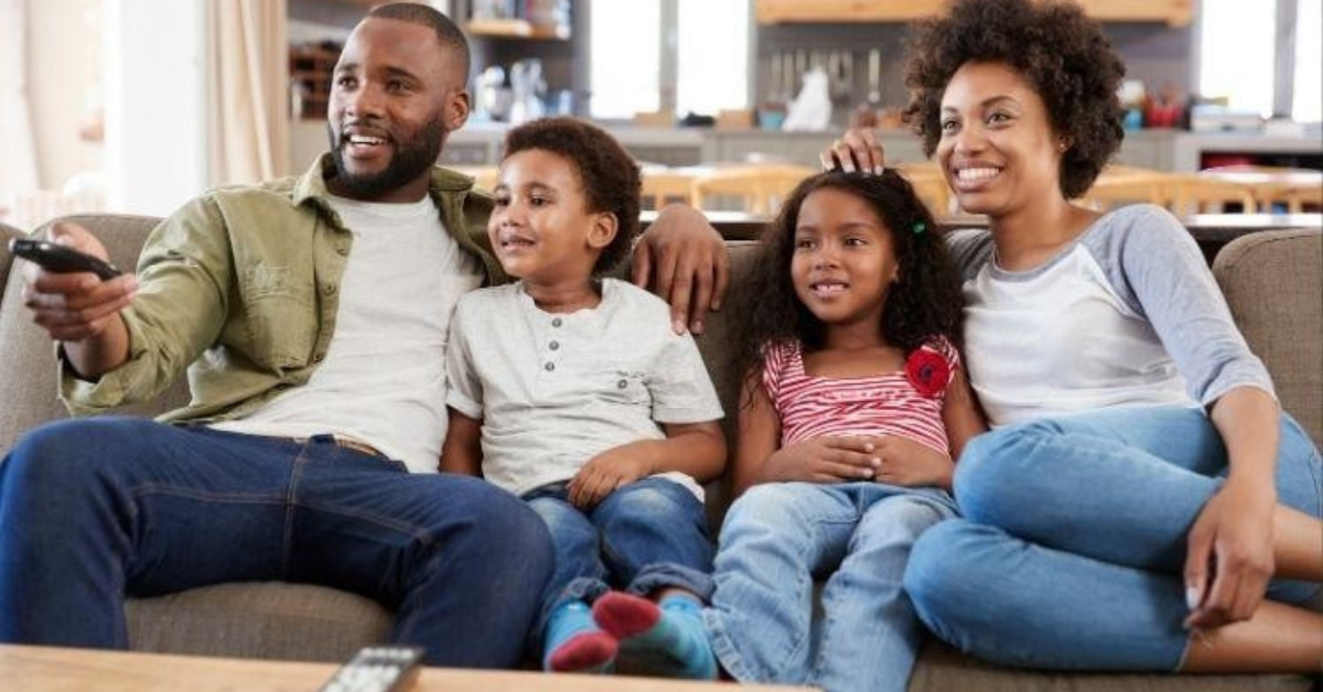 Family Watching Television Together
