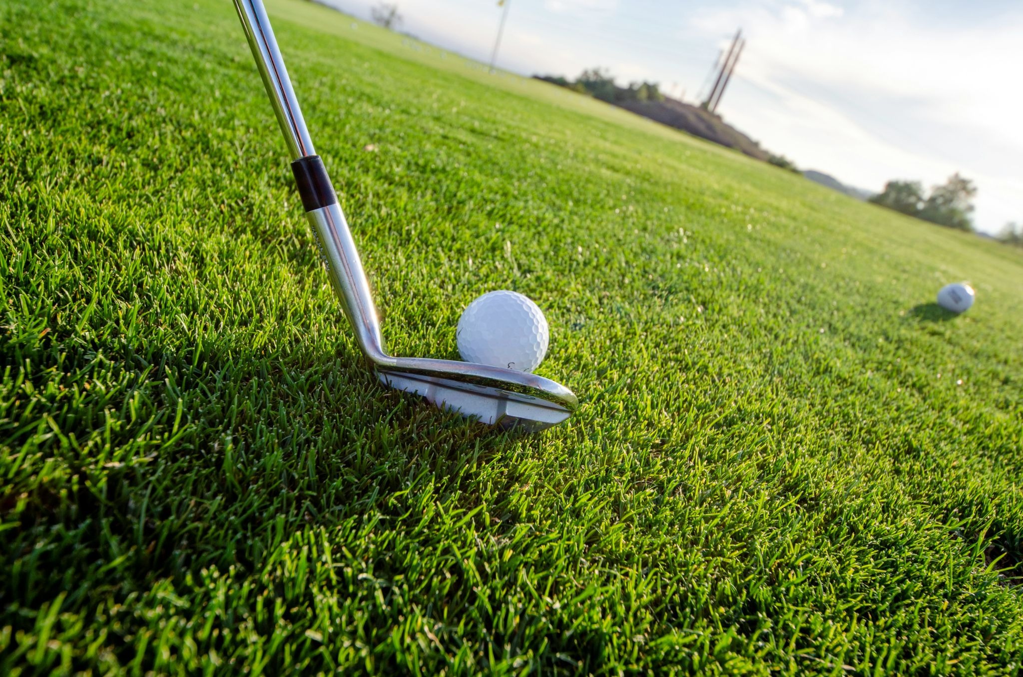 gold club and ball
