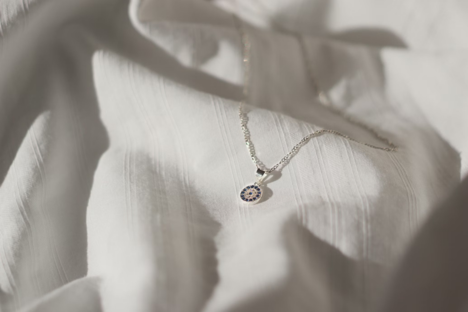 necklace on a white shirt