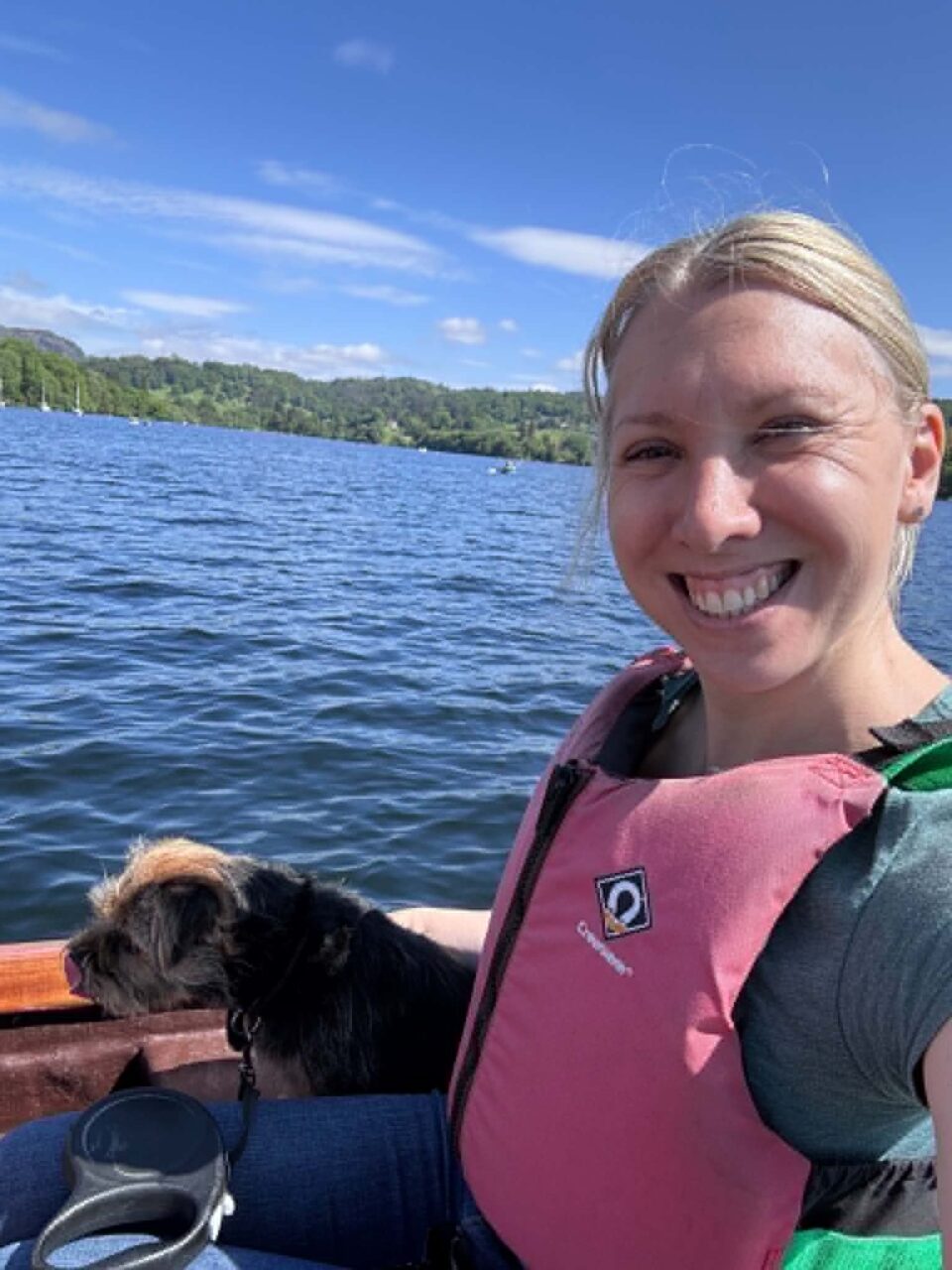 me and my border terrier on the boat