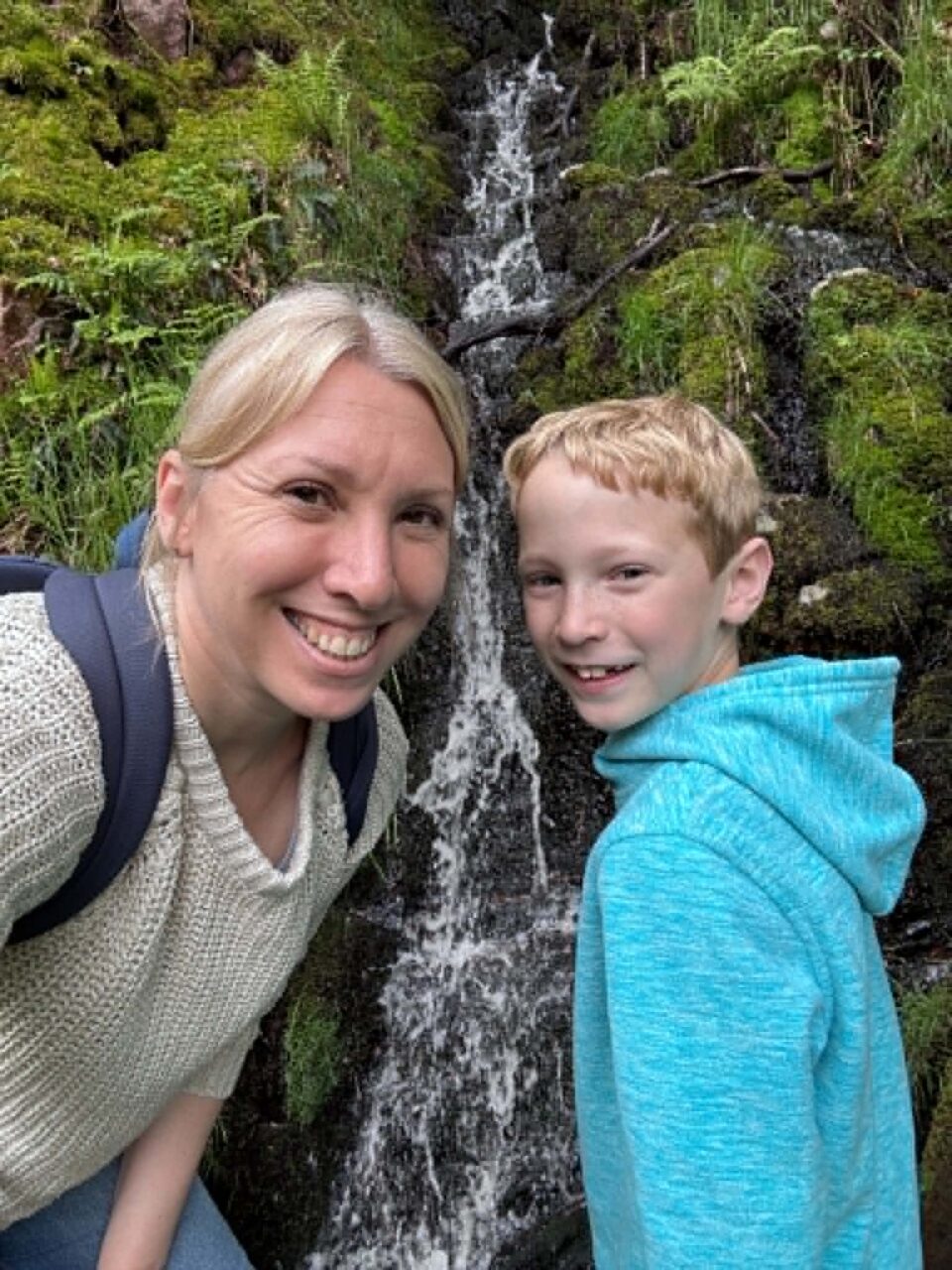 me and my youngest in front of a small waterfall