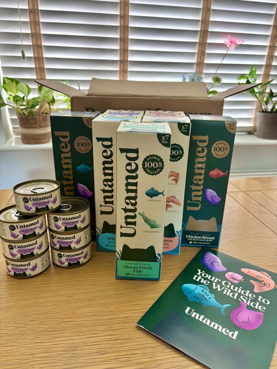 our selection of Untamed cat food in their boxes and tins for review along with the informative leaflet