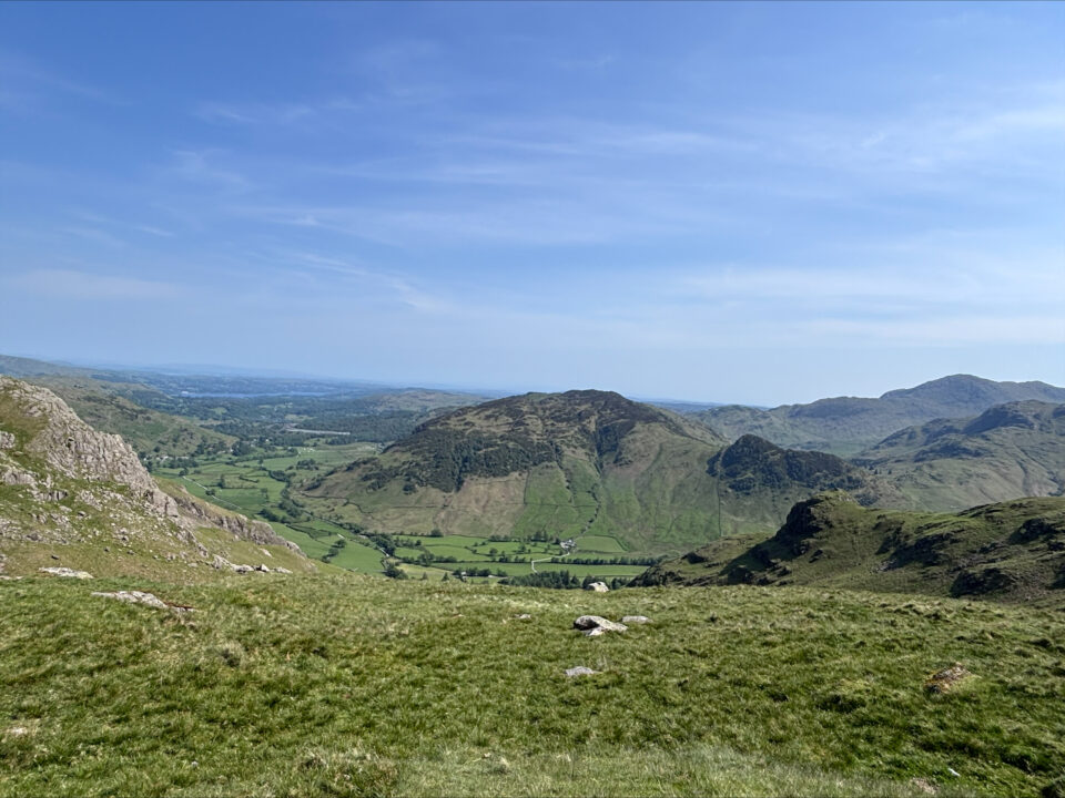 the view from Stickle Tarn across the hills and countryside