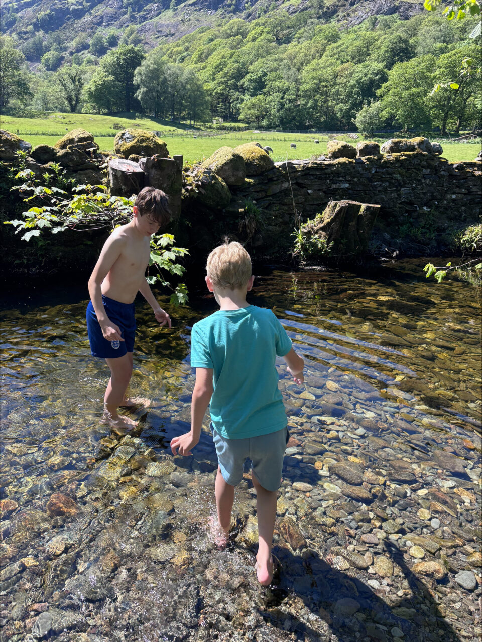 kids cooling off in the river