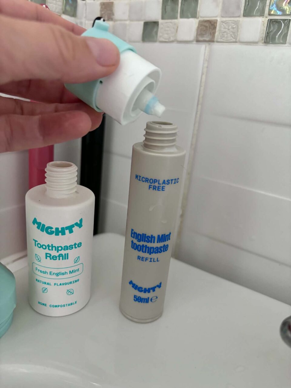 showing how the old dispenser lid went on