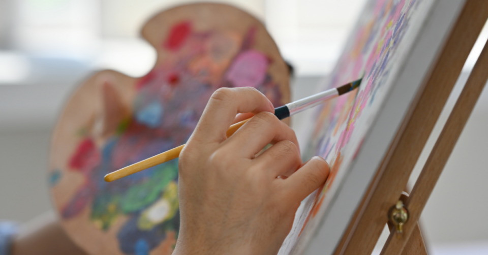 someone doing water colour painting