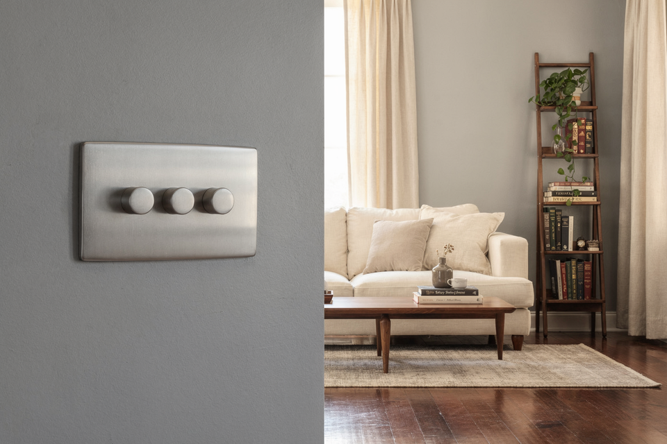 silver dimmer light switch in a living room