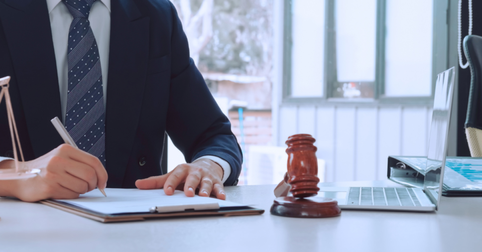 lawyer at a table doijg work